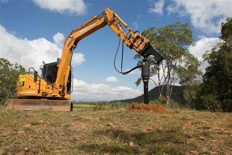 Ultimate Guide to Auger Attachments for Skid Steers & Excavators